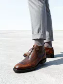 Men's dark brown handcrafted leather brogue boots by Royal Moccs.