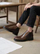 Men's dark brown handcrafted leather Chelsea boots by Royal Moccs.