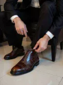 Men's dark brown handcrafted leather crocodile embossed boots by Royal Moccs.