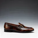 A pair of premium brown leather loafers with a supportive medicated sole for lasting comfort.