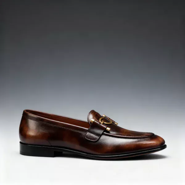 A pair of premium brown leather loafers with a supportive medicated sole for lasting comfort.