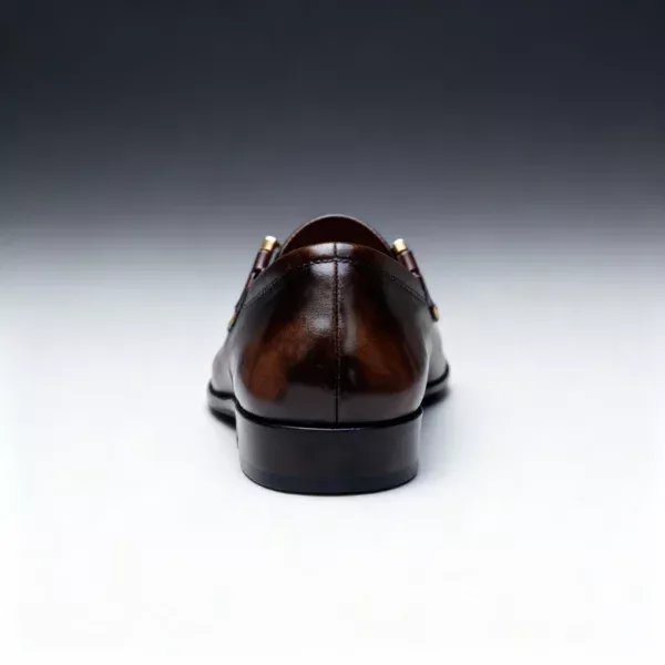 A pair of premium brown leather loafers with a supportive medicated sole for lasting comfort.