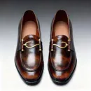 A pair of premium brown leather loafers with a supportive medicated sole for lasting comfort.