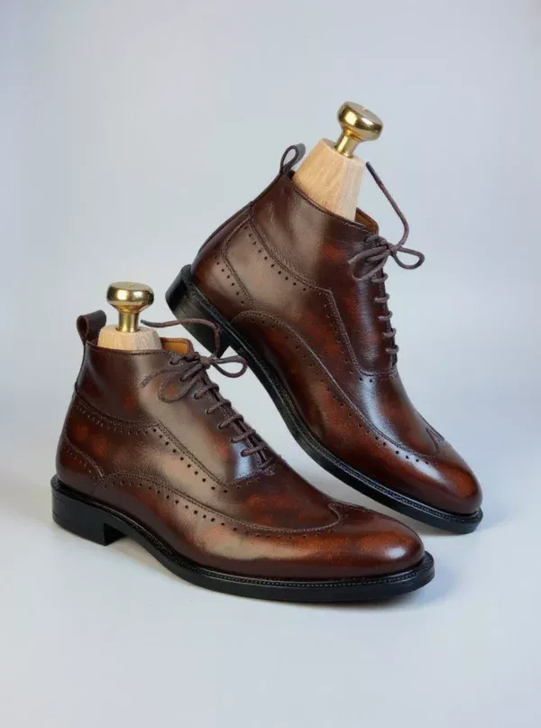 Men's dark brown handcrafted leather brogue boots by Royal Moccs.