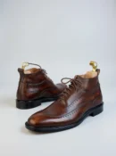 Men's dark brown handcrafted leather brogue boots by Royal Moccs.