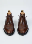 Men's dark brown handcrafted leather brogue boots by Royal Moccs.