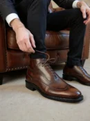 Men's dark brown handcrafted leather brogue boots by Royal Moccs.