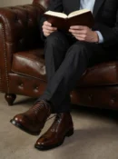 Men's dark brown handcrafted leather brogue boots by Royal Moccs.