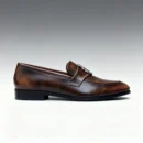 Men's dark brown handcrafted leather loafers with royal crest by Royal Moccs.