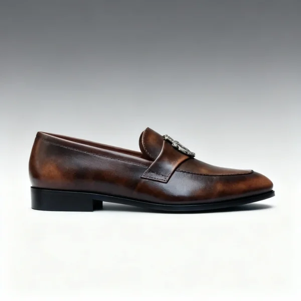 Men's dark brown handcrafted leather loafers with royal crest by Royal Moccs.