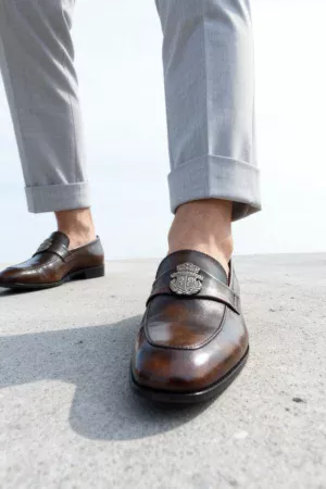 Men's dark brown handcrafted leather loafers with royal crest by Royal Moccs.