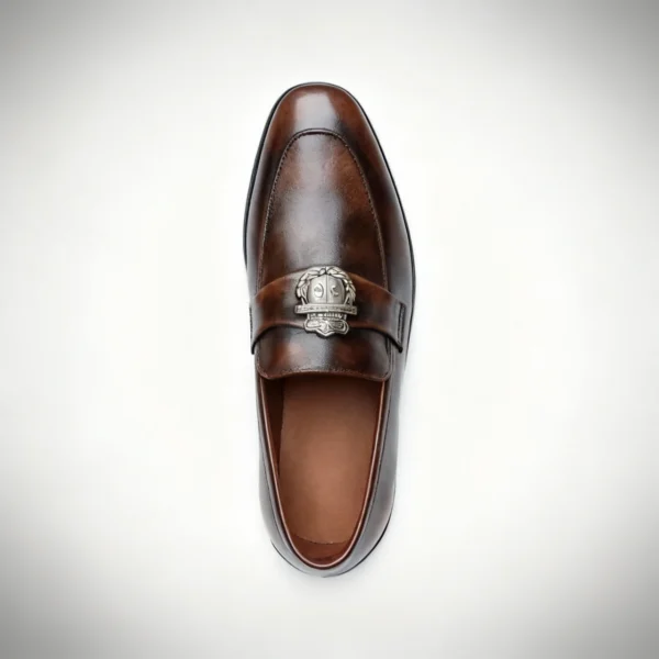 Men's dark brown handcrafted leather loafers with royal crest by Royal Moccs.