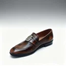 Men's dark brown handcrafted leather loafers with royal crest by Royal Moccs.