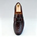 Stylish embossed leather shoes for men with silver hardware, available to buy online in Pakistan.