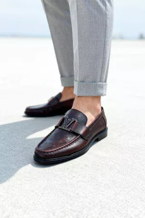 Stylish embossed leather shoes for men with silver hardware, available to buy online in Pakistan.