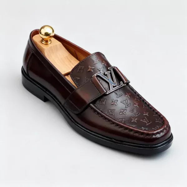 Stylish embossed leather shoes for men with silver hardware, available to buy online in Pakistan.
