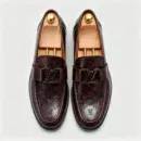 Stylish embossed leather shoes for men with silver hardware, available to buy online in Pakistan.