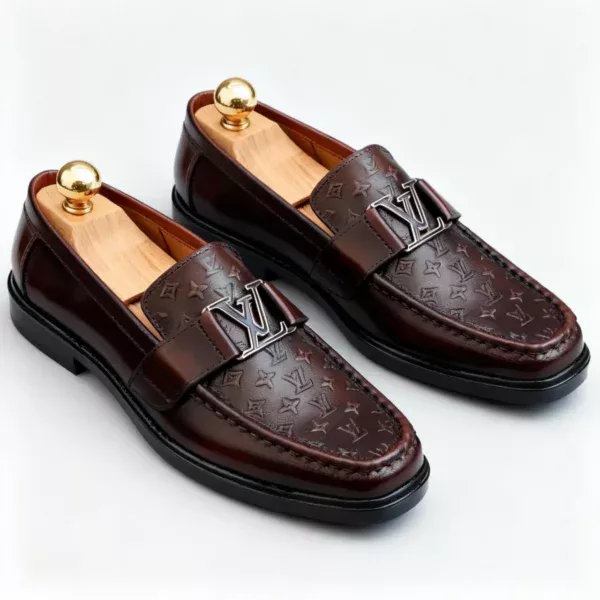 Stylish embossed leather shoes for men with silver hardware, available to buy online in Pakistan.