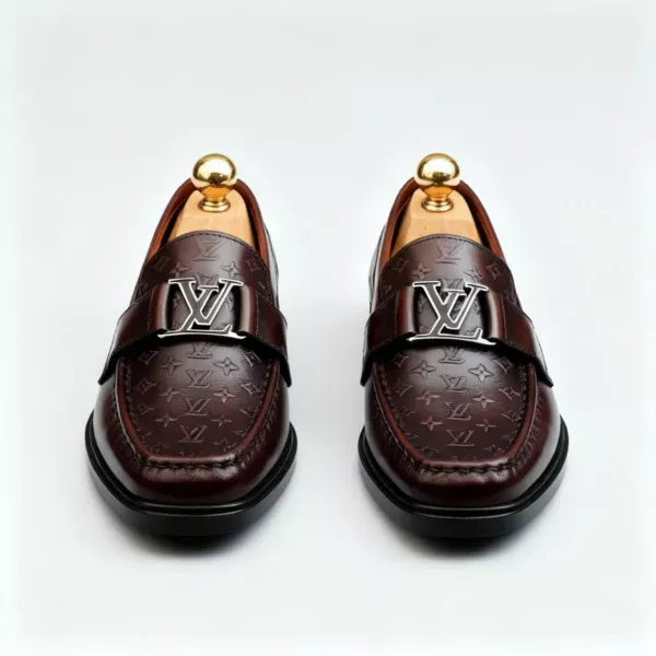 Stylish embossed leather shoes for men with silver hardware, available to buy online in Pakistan.