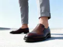 Men's brown handcrafted leather loafers with decorative stitching by Royal Moccs.