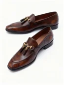 A pair of premium brown leather quilted loafers with a supportive medicated sole for lasting comfort.