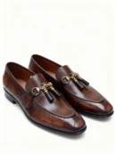 A pair of premium brown leather quilted loafers with a supportive medicated sole for lasting comfort.