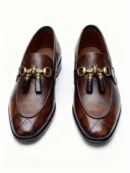 A pair of premium brown leather quilted loafers with a supportive medicated sole for lasting comfort.