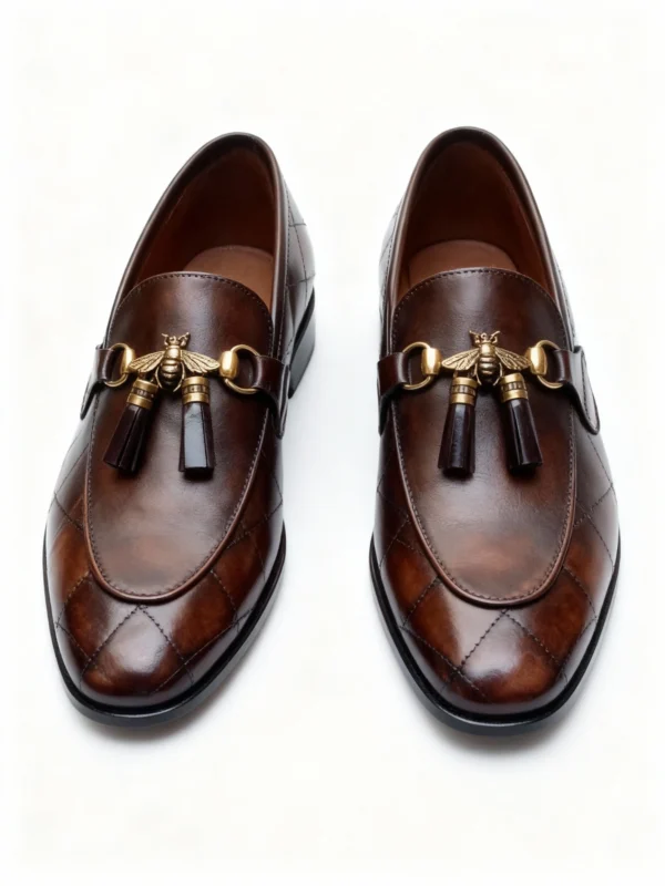 A pair of premium brown leather quilted loafers with a supportive medicated sole for lasting comfort.
