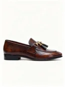 A pair of premium brown leather quilted loafers with a supportive medicated sole for lasting comfort.