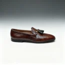 Men's brown handcrafted leather quilted tassel loafers by Royal Moccs.