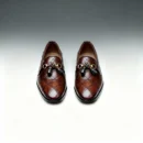 Men's brown handcrafted leather quilted tassel loafers by Royal Moccs.