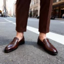 A pair of premium brown leather shoes with a supportive medicated sole for lasting comfort.