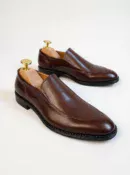 Men's brown handcrafted leather loafers with decorative stitching by Royal Moccs.