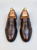 Men's dark brown handcrafted leather single strap loafers by Royal Moccs.