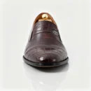Stylish formal loafers for men with silver insignia, available to buy online in Pakistan.
