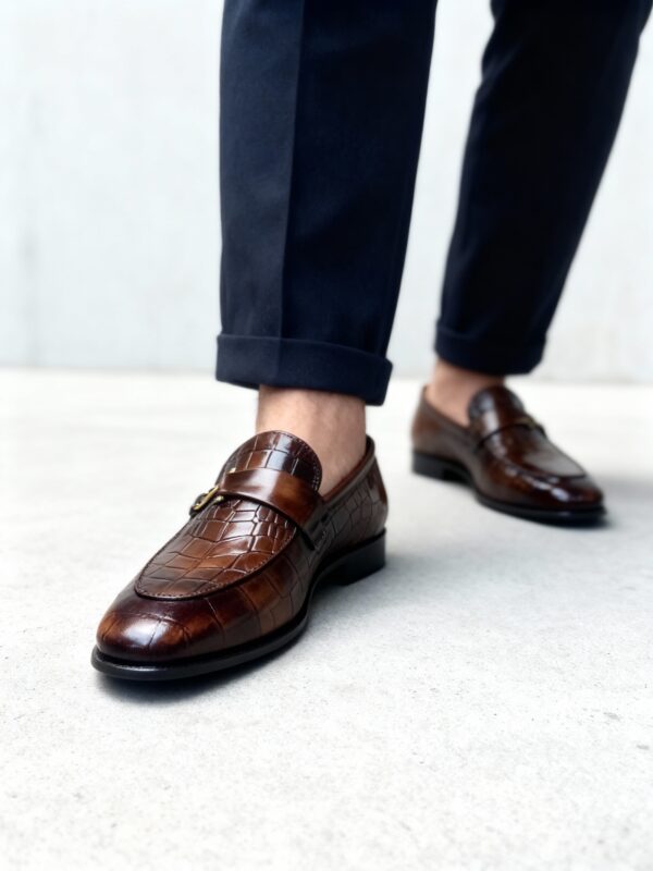 Men's brown handcrafted leather crocodile-embossed loafers by Royal Moccs.